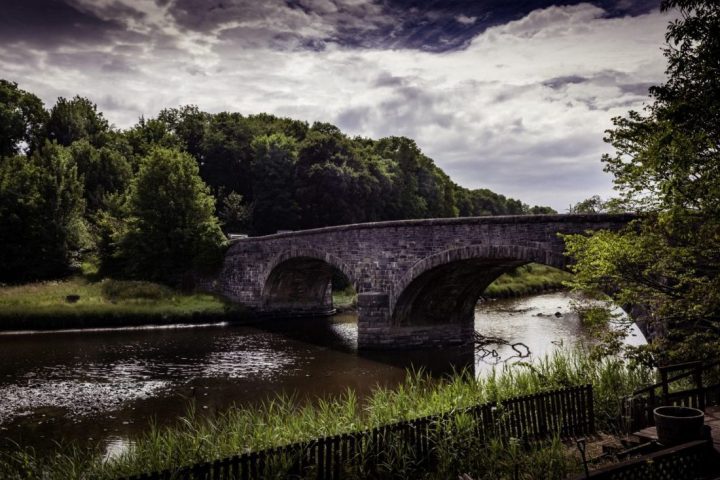 View of Bladnoch Bridge and river on summers day