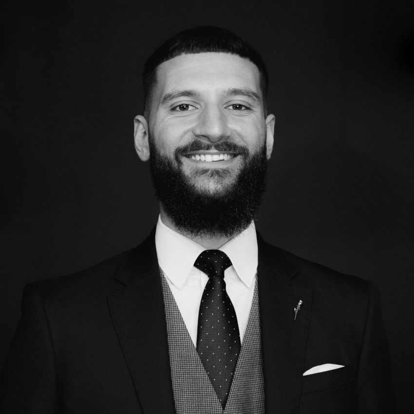 Kyle Mustafa headshot, Whiskey & Wealth Club